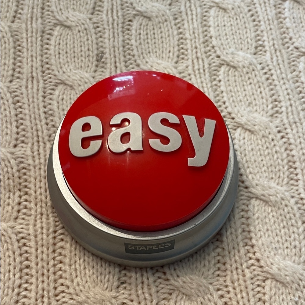Staples easy button. Battery operated 2-AAA’s depressed and says “that was easy”